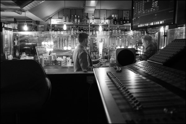 A new setting by the bar, and new discussions about the next scene - photography by Greig Clifford
