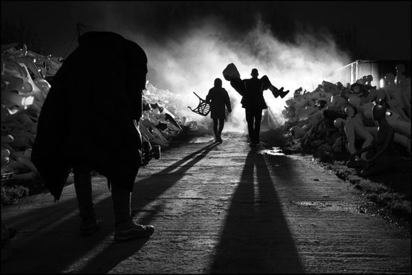 On the set of the R.I.P. music video, an "extra" is carried to position while Shaun Hodson of Loki Films checks camera settings. Photography by Greig Clifford