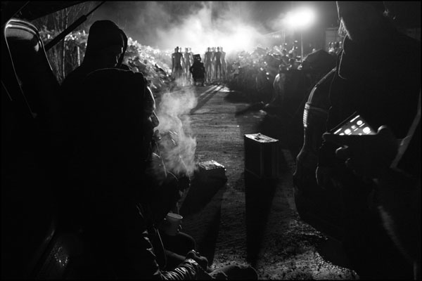 At the back of the cars during a break in filming. Photography by Greig Clifford
