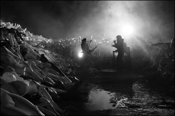 With the set clear and no more rain, one final performance completes the band filming. Photography by Greig Clifford