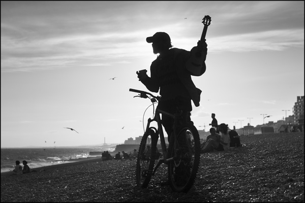 A-098. Ukulelist with a Bicycle (2) - by Greig Clifford